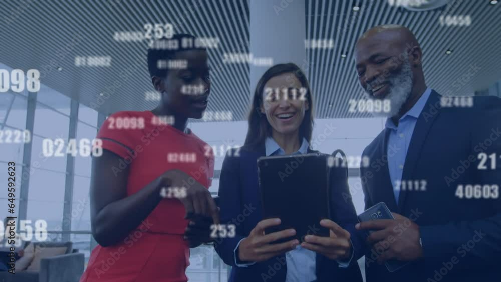 Wall mural Animation of changing numbers over diverse coworkers discussing reports on digital tablet