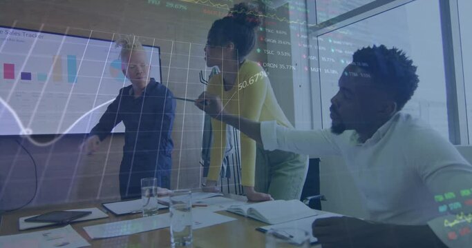 Animation of stock market data processing against diverse colleagues discussing together at office