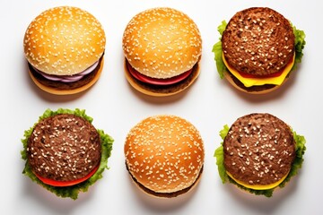 Collection of delicious burgers and cheeseburgers with lettuce, tomato, onion and sesame seed bun on white background