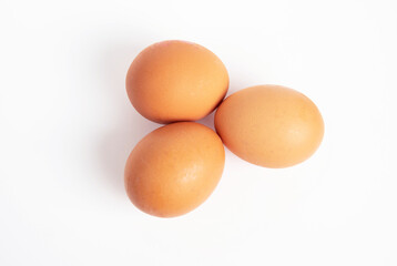 yellow chicken eggs on a white background