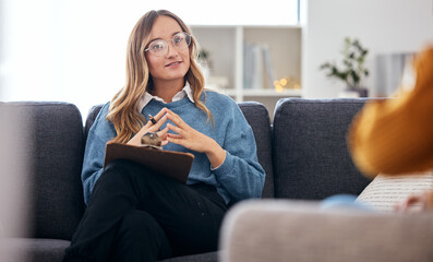 Counseling, therapy and woman therapist talking to client in a consultation or psychology...