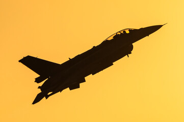 Sunset fighter jet