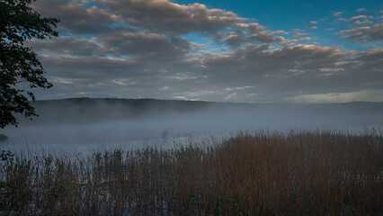 Early morning before the fog lifts from the surface of the water