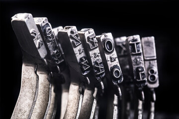 Close up of vintage typewriter letters