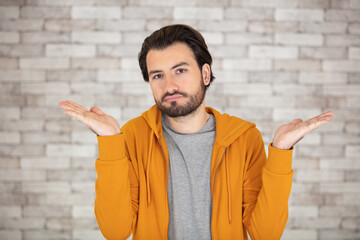 portrait of confused clueless man