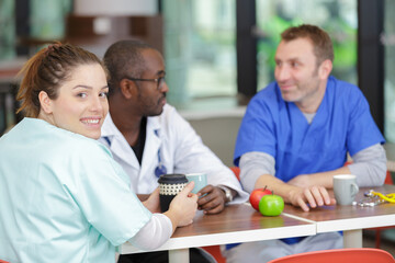 medical workers talking in the cantine
