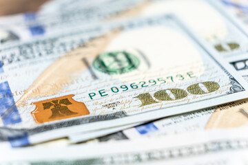 A lot of 100 dollar bills close-up macro.