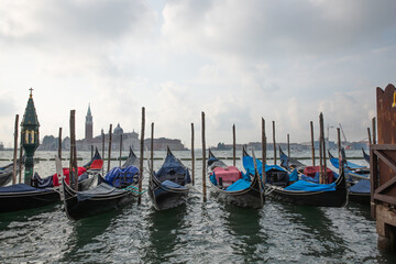 Fototapeta premium Gondolas in Venice, Italy in dock
