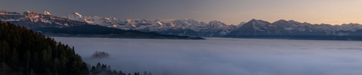 Panorama Swiss Alps with fog sea