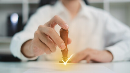 ็Hand's of businessman, notary or lawyer stamp to approved business authority, signature,...