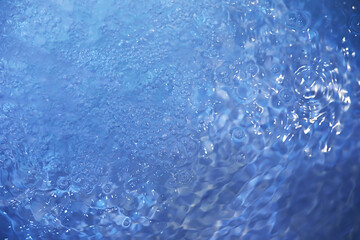 Obraz premium Blue water texture. Bubbles and bubbling water.