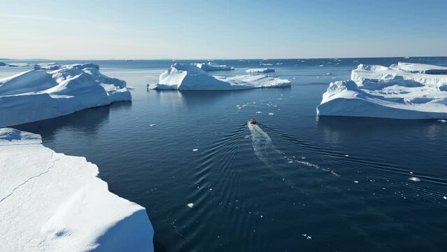 Greenland Ilulissat Icefjord Aerial View. Iceberg and glacier ice in Arctic nature landscape in Greenland. Ilulissat, Disko Bay, Baffin Sea, Greenland.