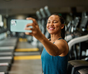 gym sport fitness exercise health healthy woman training phone selfie photo portrait self posing...