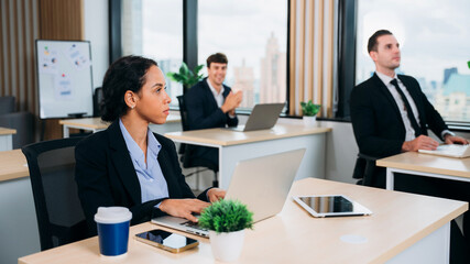 Businesspeople Professional Discussion in Modern Office. Coworkers team Collaborating on Research Strategy. Smiling group of diverse business working together.