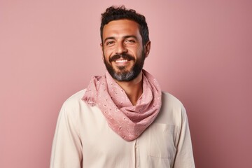 Obraz premium portrait of a confident Israeli man in his 30s wearing a foulard against a pastel or soft colors background