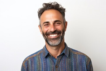 Obraz premium portrait of a happy Israeli man in his 40s wearing a chic cardigan against a white background