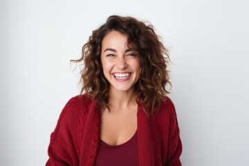 Obraz premium medium shot portrait of a happy Mexican woman in her 30s wearing a chic cardigan against a white background