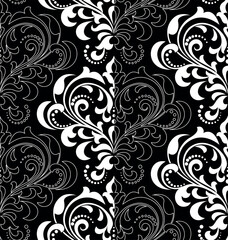 Wallpaper in the style of Baroque. Seamless vector background. White and black floral ornament. Graphic pattern for fabric, wallpaper, packaging. Ornate Damask flower ornament