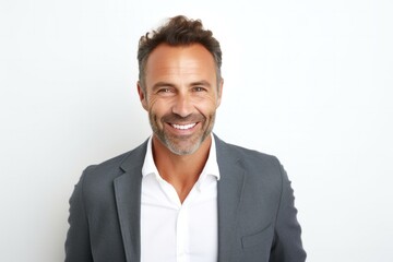 medium shot portrait of a Israeli man in his 40s wearing a chic cardigan against a white background