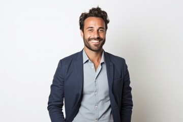 Fototapeta premium portrait of a Israeli man in his 30s wearing a chic cardigan against a white background