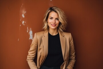 medium shot portrait of a Polish woman in her 30s wearing a classic blazer against an abstract background