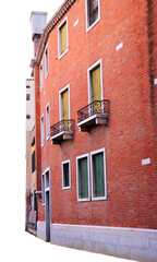 Old house from red brick with balcony isolated PNG photo with transparent background. High quality cut out scene element.