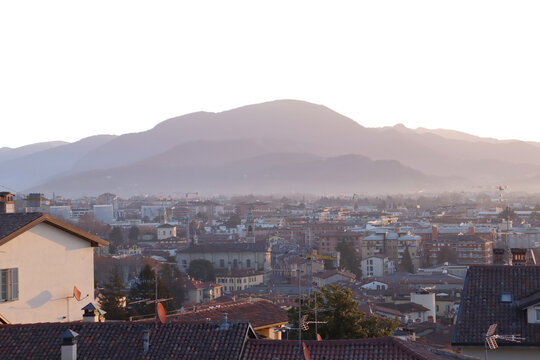 Panoramic view of the city and mountains, Bergamo isolated PNG photo with transparent background. City scene, old buildings. High quality cut out scene element.