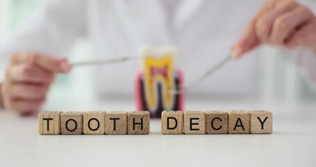 Dentist word caries and dental treatment. Dental caries causes symptoms diagnosis and treatment