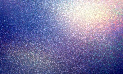 Holographic light on blue glittering sanded texture.