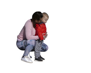 Jeune mère accroupie vue de profil avec son petit garçon en extérieur, vêtus de tenues...