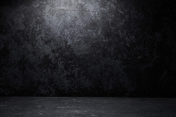 Black abstract textured background with stains and scratches. Wall and floor grunge style