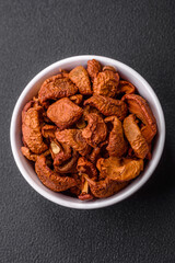 Delicious ripe red apple, sliced and dried in a special dryer