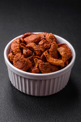 Delicious ripe red apple, sliced and dried in a special dryer