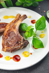 lamb cutlet meat on the bone second course fresh meat portion food appetizer meal food snack on the table copy space food background rustic top view