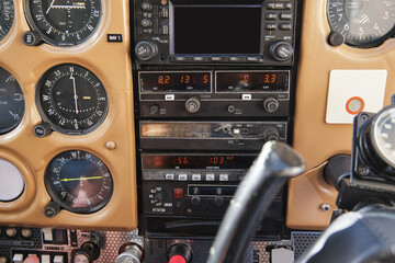 Cockpit control system in airplane in daylight