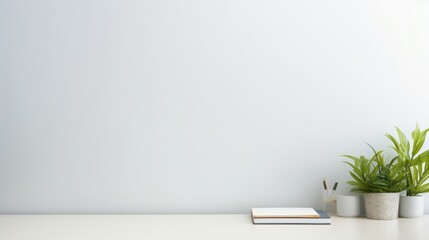 Workspace - office table, empty desk with supplies against the white wall, copy space for text or product showcase