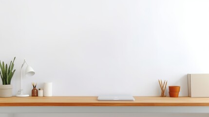 Workspace - office table, empty desk with supplies against the white wall, copy space for text or...