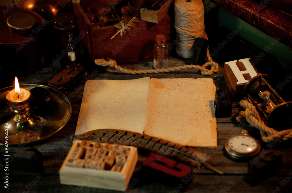 Fototapete vintage sheet of paper with pheasant feather on wooden table. retro type objects and old wooden typo