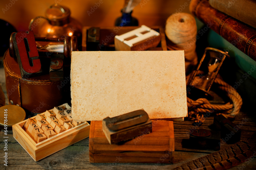 Fototapete vintage sheet of paper on wooden table. retro type objects and old wooden typographic blocks. letter