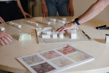 Scale model of a group of buildings in the office of an architecture firm.