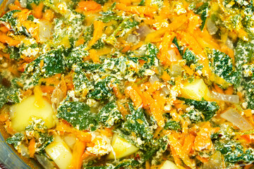 Nettle soup with carrots, close up.