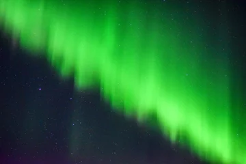 Fotobehang Aurora borealis (Northern lights) in the sky of Swedish Lapland. © Adam