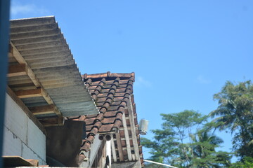 Traditional house roof with clear and blue sky