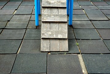 Close up of old wooden stairs of children's toys in the playground.