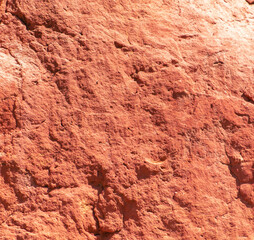 Red rock as an abstract background. Texture
