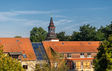 Tiefurt near Weimar in the morning, with view over the roofs to the church tower