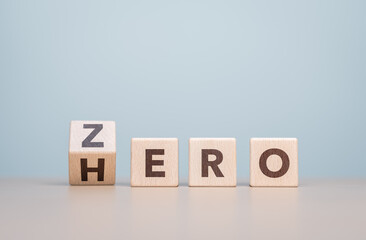 Wooden cube flipping with word ZERO to HERO. Change for the better. Concept of personal...