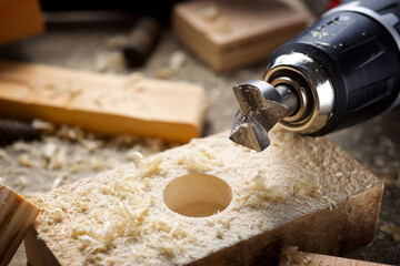 Wood milling cutter on a carpenter table