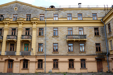 Naklejka premium View of the facade of typical soviet building, the construction of the 1950s in the style of Stalin Empire
