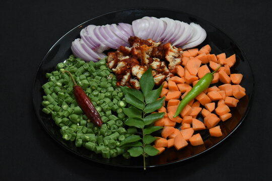 ingredients for chicken fried rice chopped cut vegetable carrot beans chilli onion